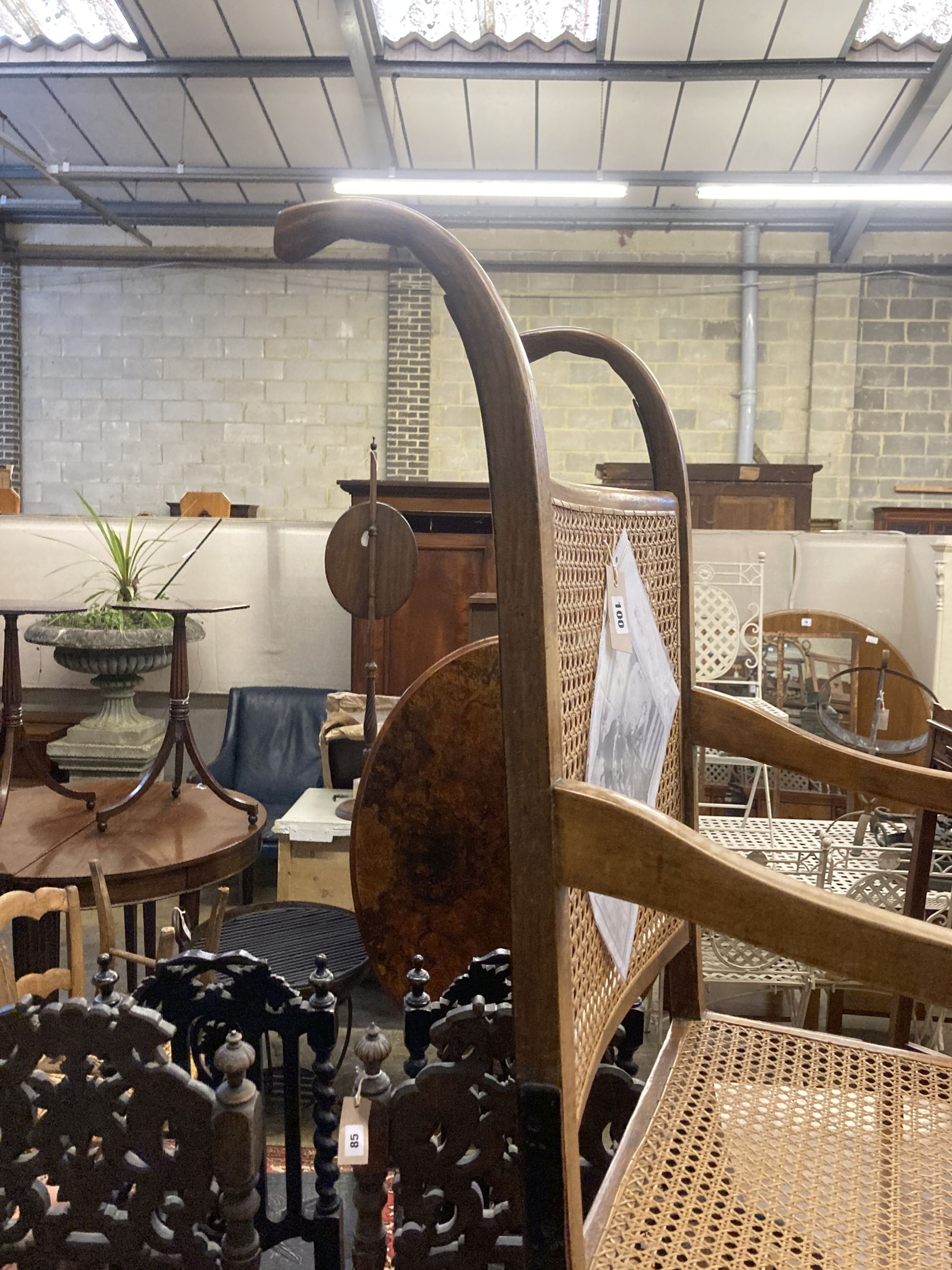 An early 20th century Wardway caned beech invalids chair, width 50cm, depth 80cm, height 118cm